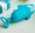 Mud Pie mini water blasters, shown in one of four available colors