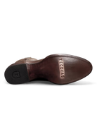 Brown leather shoe sole with 'Tecovas' branding on a white background