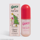 The Grinch x Kitsch Cherry Cheer hair perfume, red-capped bottle shown with its box