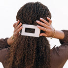 Teleties Almond Beige Medium Flat Rectangle Hair Clip worn in long curly half-up hair