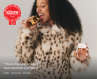 Model in leopard coat holding Touchland Midnight S'mores with Allure Best of Beauty badge