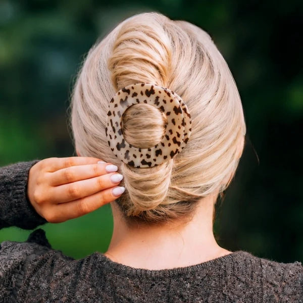 Teleties blonde tortoise large flat circle clip holding a twisted updo