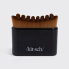 Black Kitsch Lymphatic Contour Face Brush, straight-on front view with logo