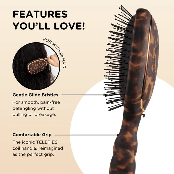 Teleties tortoise Detangler Brush features graphic: gentle glide bristles and coil grip