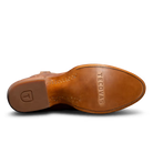 Brown leather shoe sole with 'Tecovas' branding on a white background