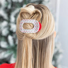 Teleties Festive Feels Small Flat Round Hair Clip, red and white print, in blonde half-up hair