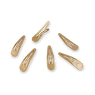 Teleties gold snap clips 6 pack, scattered on black background