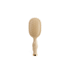 Teleties Mini Detangler Brush in tan, bristle side front view
