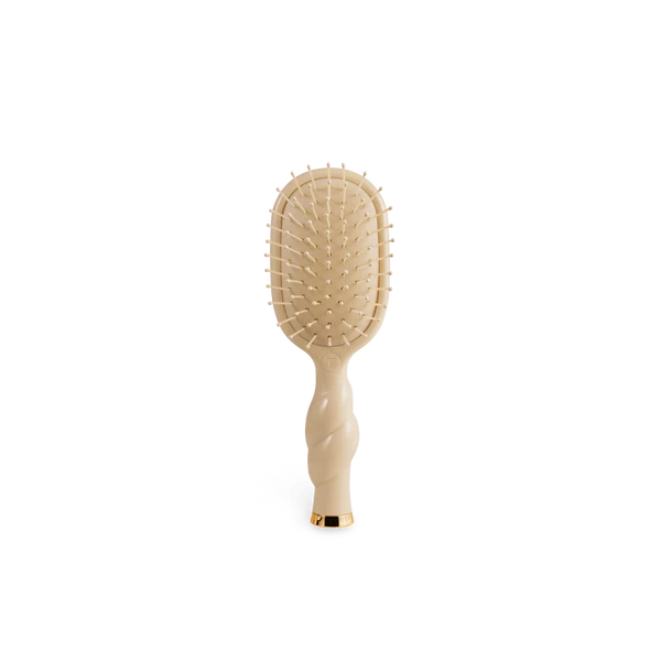Teleties Mini Detangler Brush in tan, bristle side front view