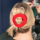 Teleties Large Flat Circle Hair Clip in Red Carpet Ready red holding a blonde bun