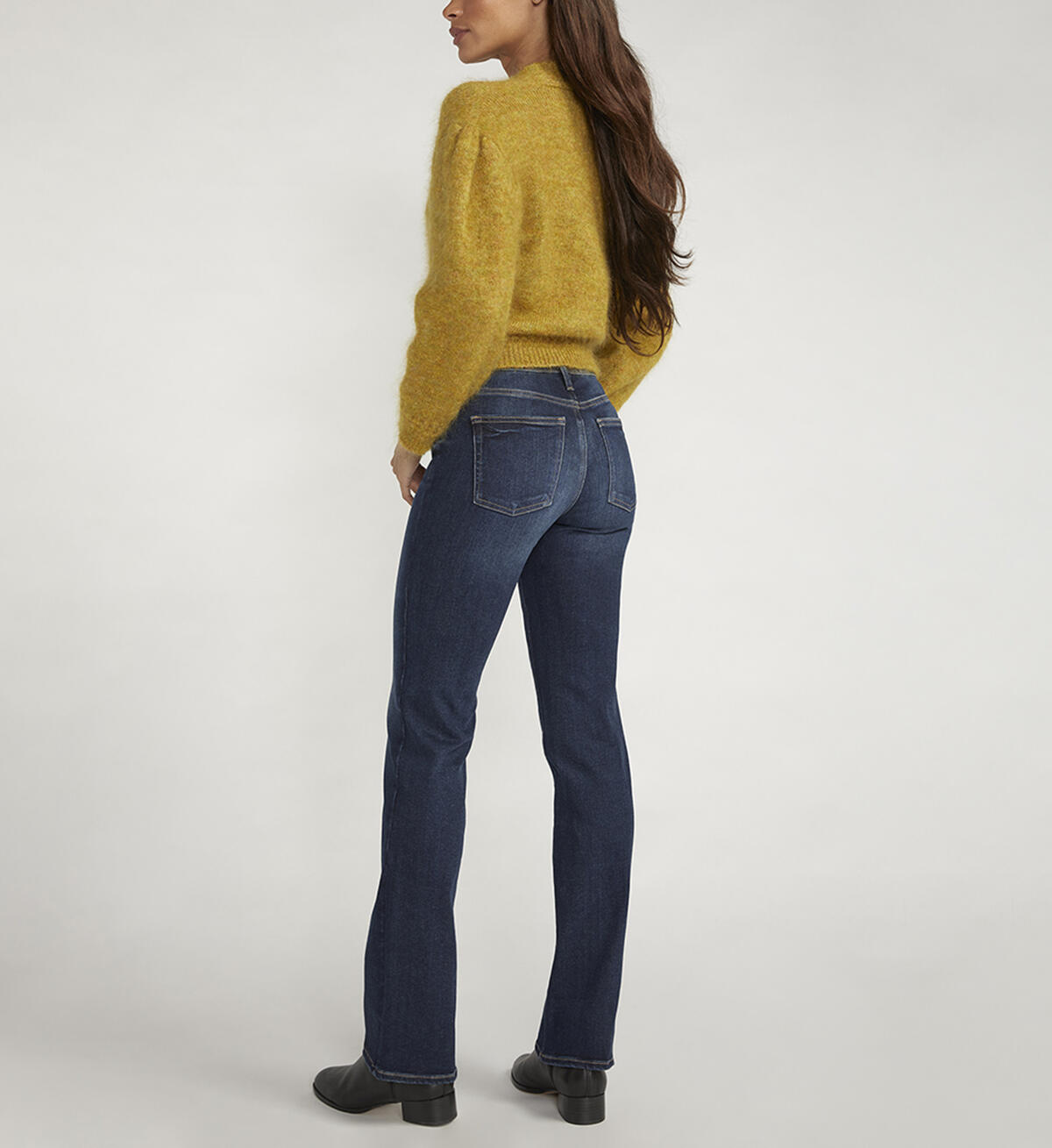 Infinite Fit Mid Rise Bootcut Jeans